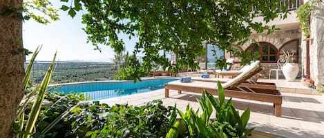 2 outdoor pools, pool umbrellas, sun loungers