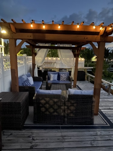 Waterfront Beach Bungalow with 150 Foot Dock on Guana Cay and Waterside Pergola