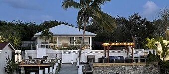 Waterfront Beach Bungalow with 150 Foot Dock on Guana Cay and Waterside Pergola