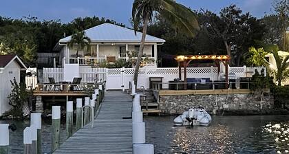 Waterfront Beach Bungalow with 150 Foot Dock on Guana Cay and Waterside Pergola
