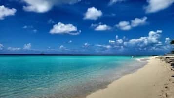 On the beach, sun-loungers, beach towels
