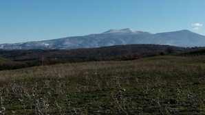 A mountain landscape with a clear sky.