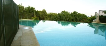 Provencal family home overlooking a superb garden, heated swimming pool