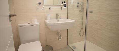 Bathtub, hair dryer, towels