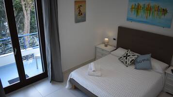 Family Apartment | Egyptian cotton sheets, premium bedding, memory-foam beds, in-room safe