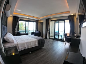 Chambre Deluxe, vue mer | Literie de qualité supérieure, minibar, bureau, Wi-Fi gratuit