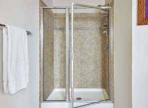 Combined shower/tub, hair dryer, towels, soap