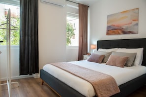 2 chambres, fer et planche à repasser, Wi-Fi, draps fournis