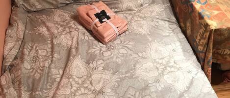 1 bedroom, desk, iron/ironing board, travel crib