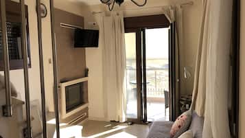 Smart TV, fireplace, books