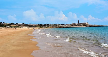 A FEW METERS FROM THE SEA BETWEEN BAROQUE AND MONTALBANO
