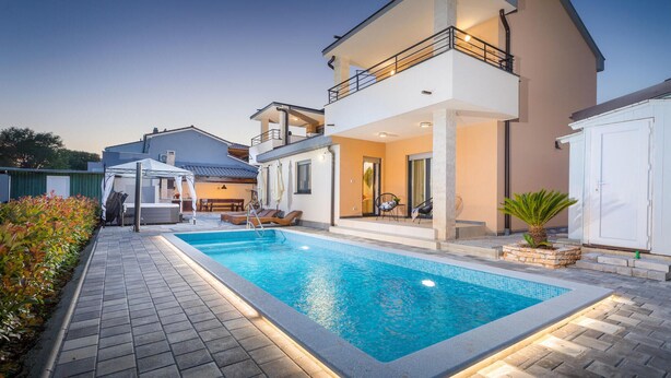 A modern two-story house with a swimming pool, outdoor seating, and a covered patio area. - Awesome home in Stinjan (Stinjan)