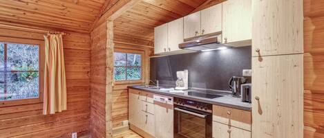 Fridge, stovetop, dishwasher, coffee/tea maker