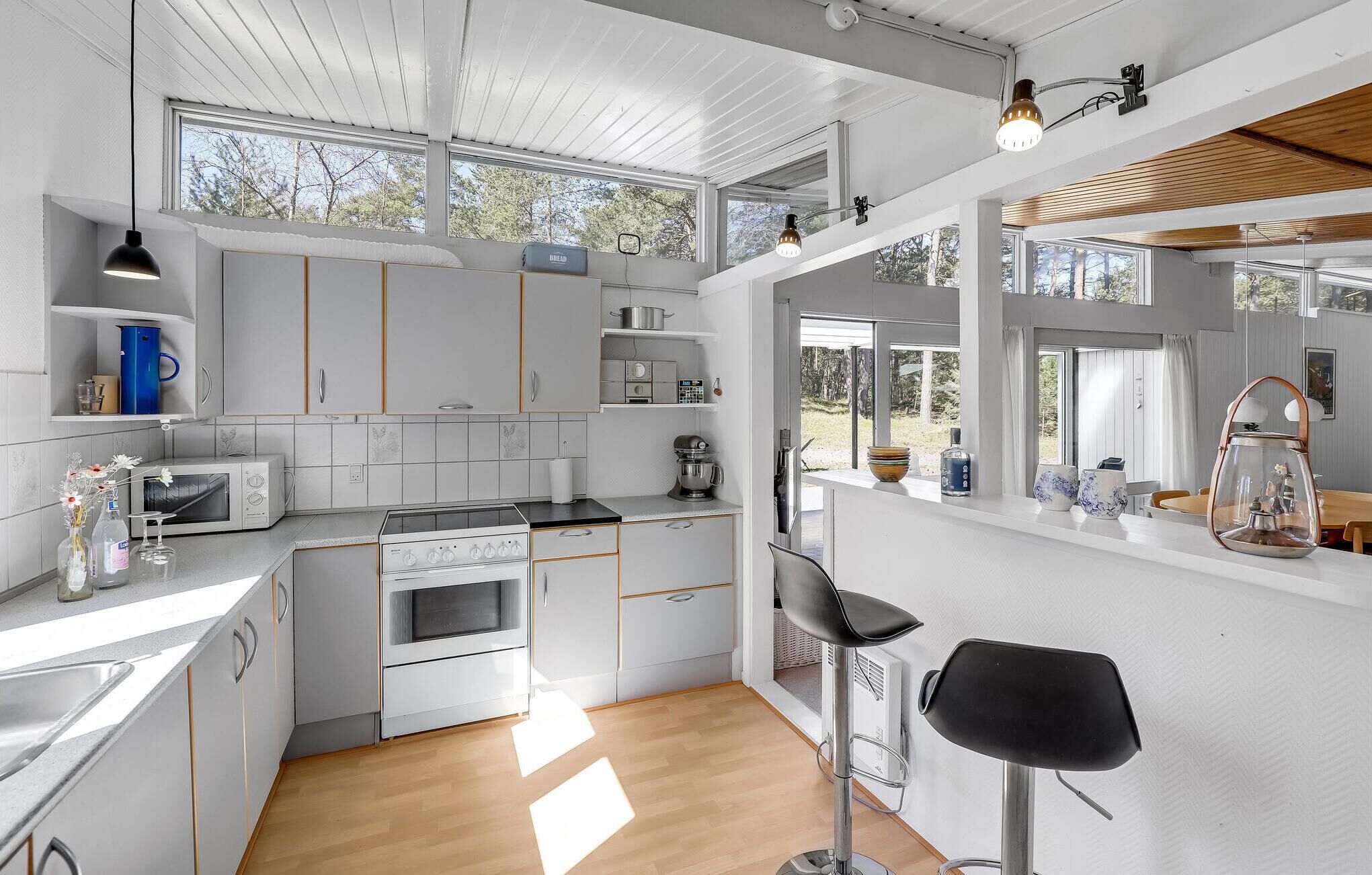 Fridge, stovetop, dishwasher, coffee/tea maker