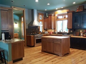 Fridge, microwave, oven, stovetop - Gorgeous five bedroom home sleeps up to 13 guests. Extensive decks wrap the home, fishing pond, 11 acres with forest, pasture, and abuindance of wildlife. (Ashford)