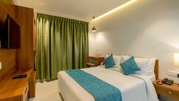 Habitación Deluxe doble | Ropa de cama de alta calidad, colchones Select Comfort, caja fuerte