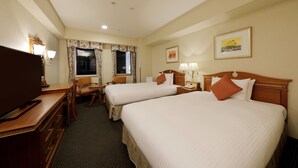 A hotel room with two beds, a desk with a TV, a chair, a desk lamp, and a window with curtains. - KOKO HOTEL Nagoya Sakae (Nagoya)