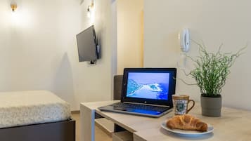 1 chambre, fer et planche Ă repasser, Wi-Fi, draps fournis