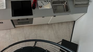 Penthouse Apartment | Private kitchen | Full-sized fridge, microwave, espresso maker