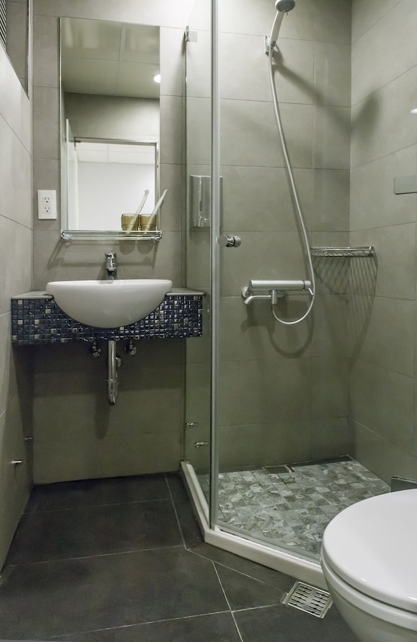 Basic Double Room, 1 Double Bed | Bathroom | Shower, hydromassage showerhead, free toiletries, hair dryer