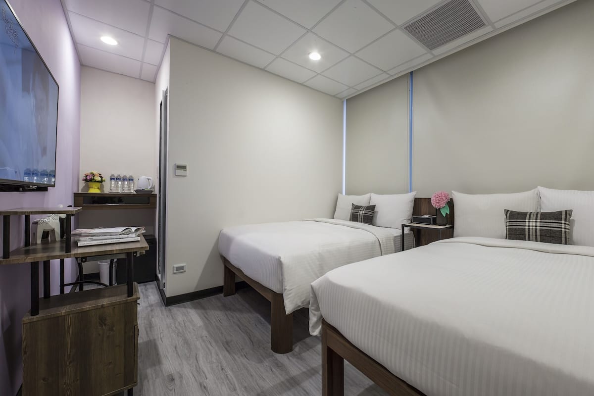 Basic Quadruple Room, 2 Double Beds | Down comforters, desk, WiFi (free)