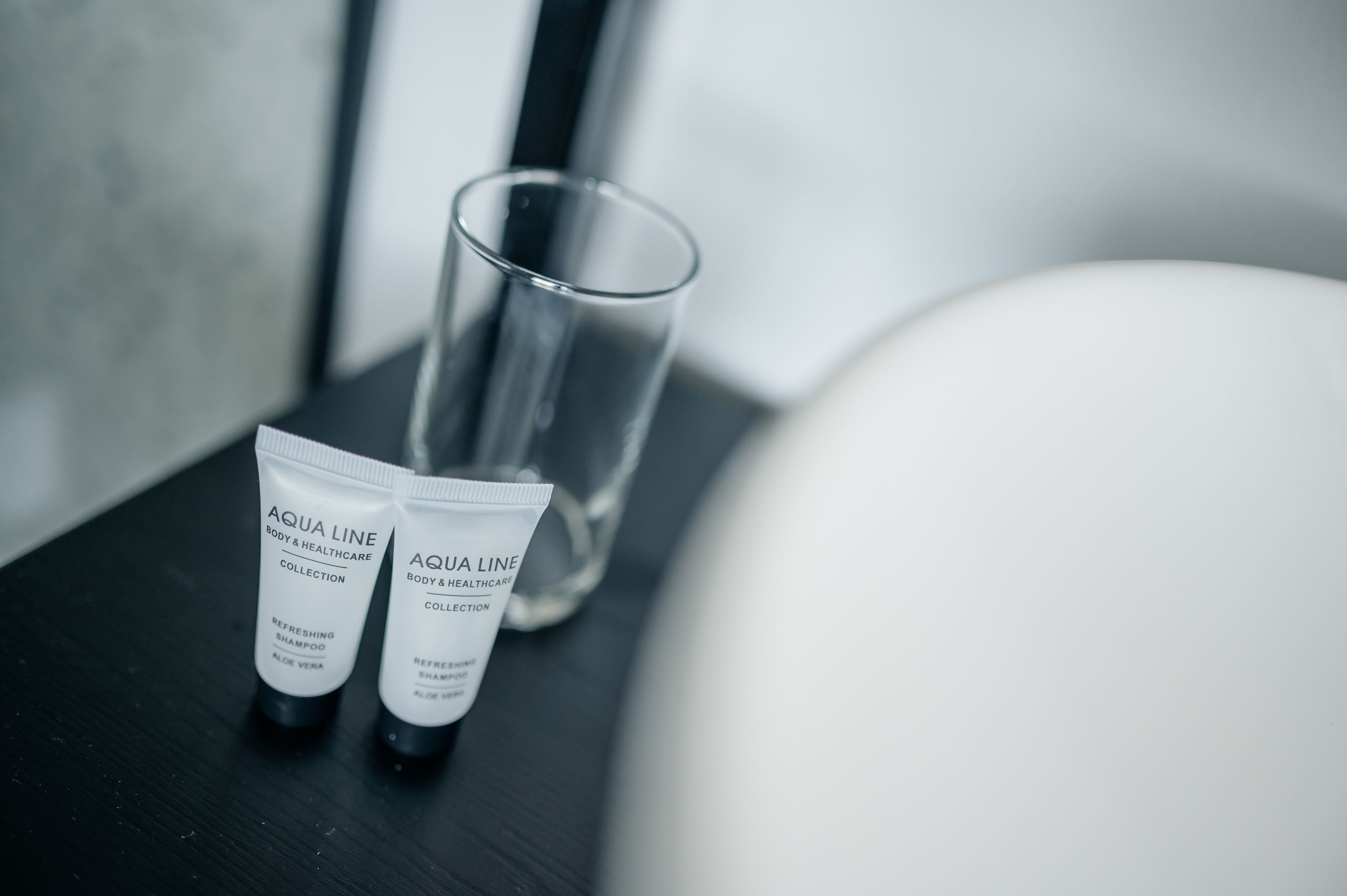 Shower, rainfall showerhead, hair dryer, towels