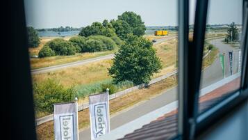 Enjoy the serene view of the surrounding landscape from the comfort of your room.