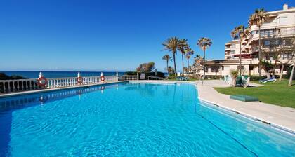 Beachfront Apartment in Lubina del Sol | Pool, Padel, Parking & Beach Access