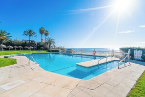 Outdoor pool - Beachfront Apartment in Lubina del Sol | Pool, Padel, Parking &  Beach Access (Mijas)