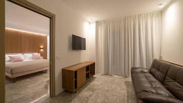 Suíte, sacada | Área de estar | Smart TV