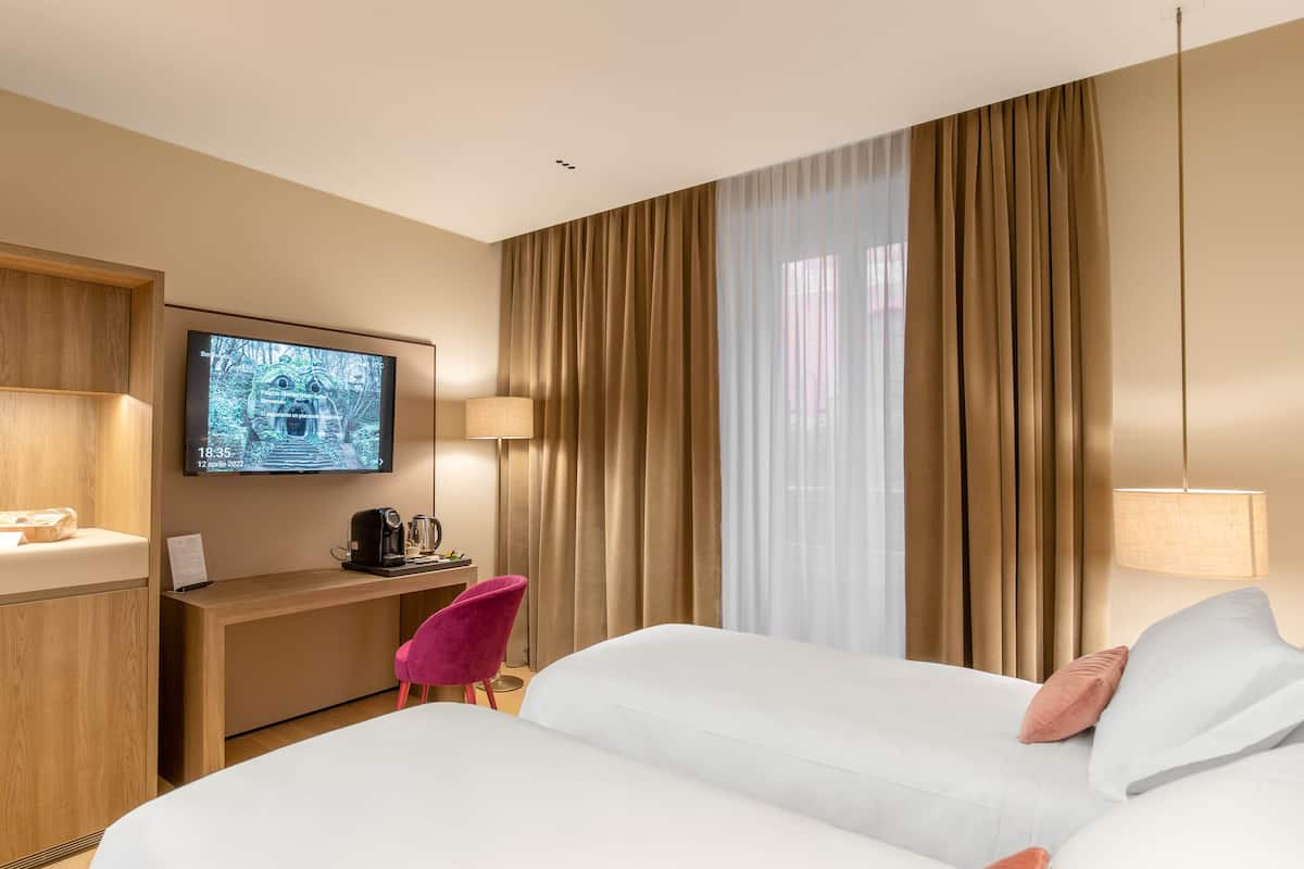 Executive | Premium bedding, down comforters, memory foam beds, minibar