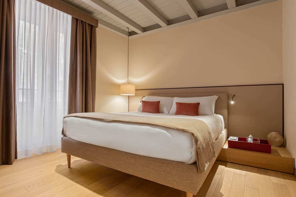 Suite | Premium bedding, down comforters, memory foam beds, minibar