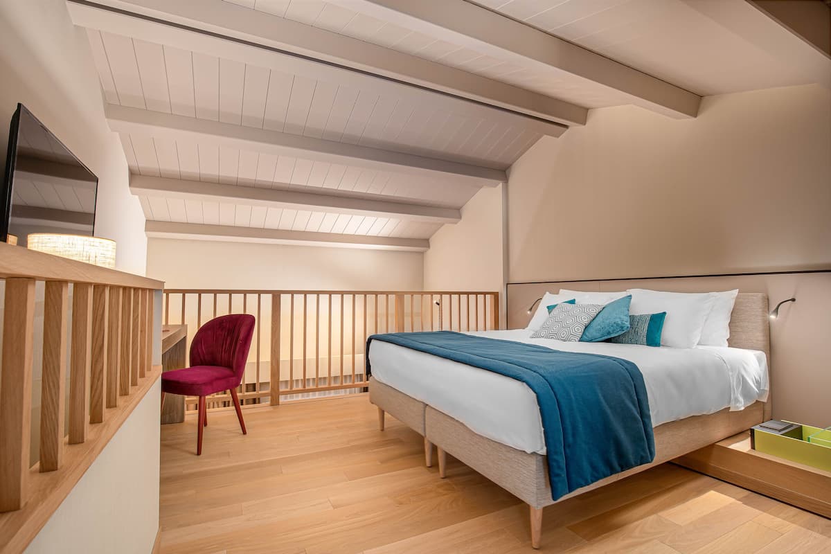 Premium bedding, down comforters, memory foam beds, minibar