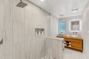 Shower, hair dryer, towels, soap