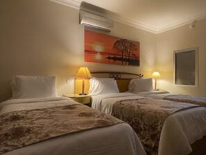 Basic Triple Room | Minibar, in-room safe, free WiFi, bed sheets