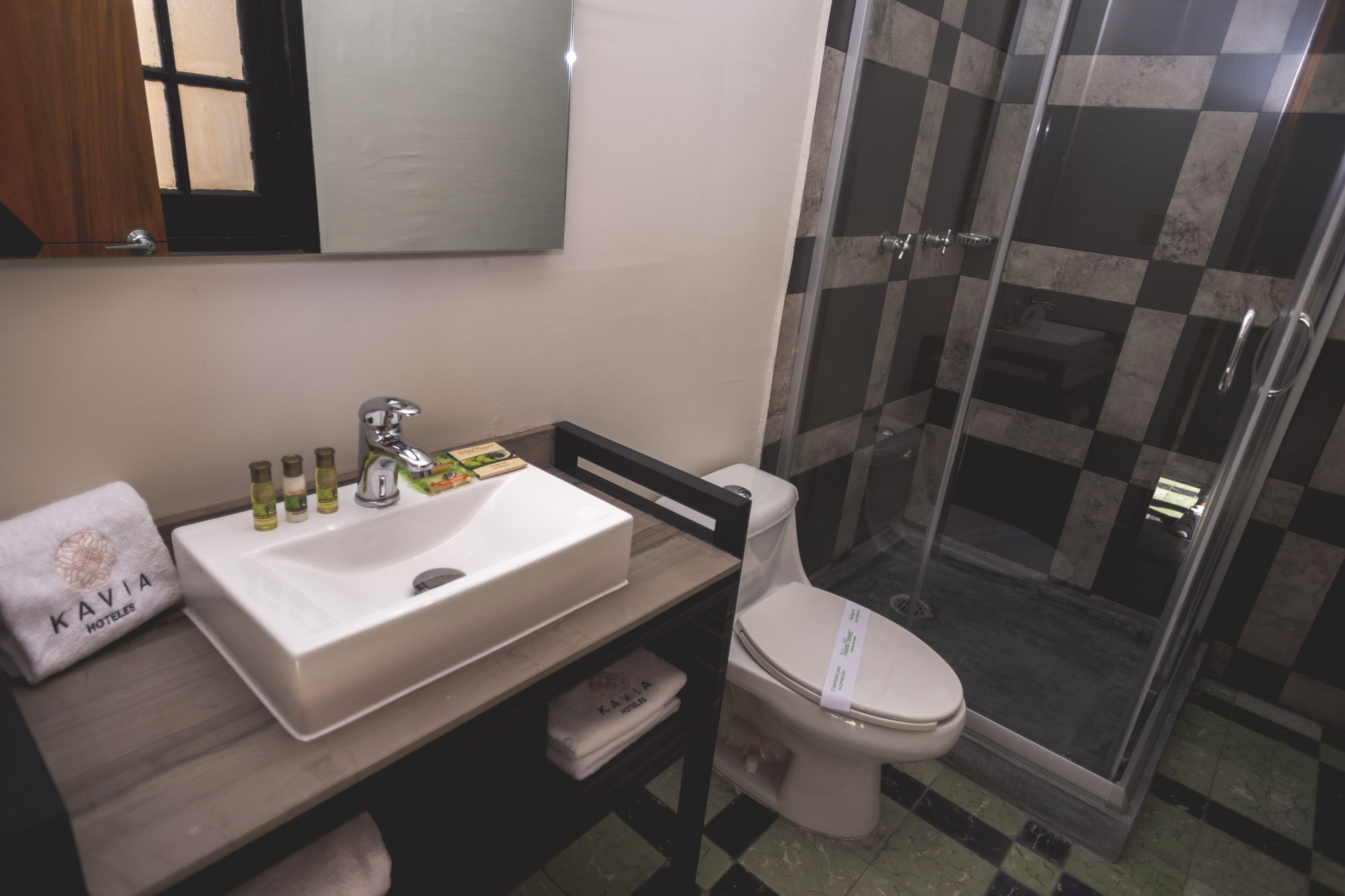 shower, free toiletries, hair dryer, towels