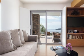 Superior Villa | Living area | 42-inch Smart TV with satellite channels, TV, Netflix