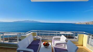 Apartment, 2 Bedrooms, Sea View | Desk, laptop workspace, iron/ironing board, free WiFi