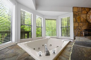 Combined shower/tub, hair dryer, towels, soap