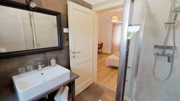 Villa | Bathroom | Shower, deep soaking tub, bidet, towels
