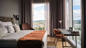 Desk, laptop workspace, blackout drapes, soundproofing