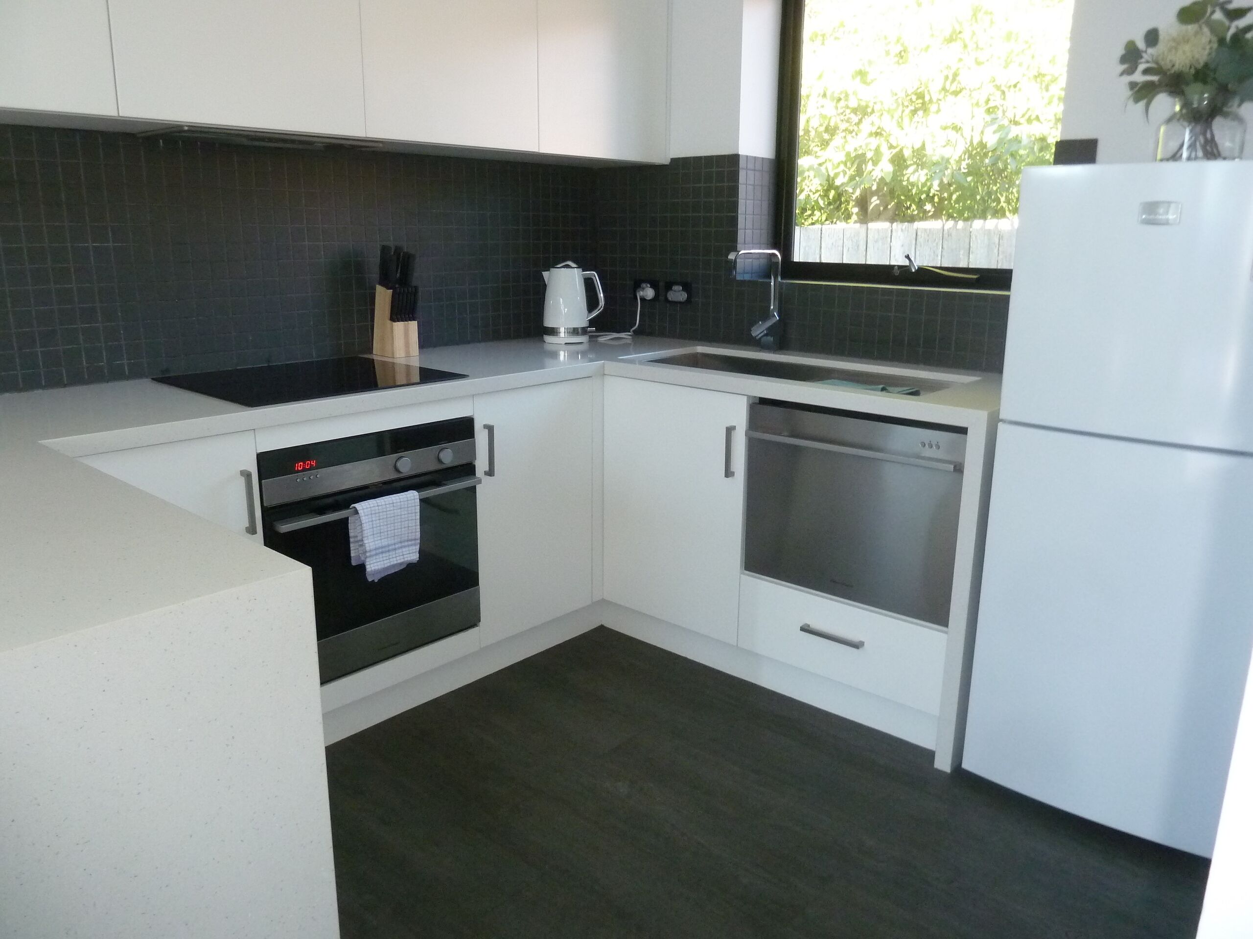 Situated across the road from the beach — image 4