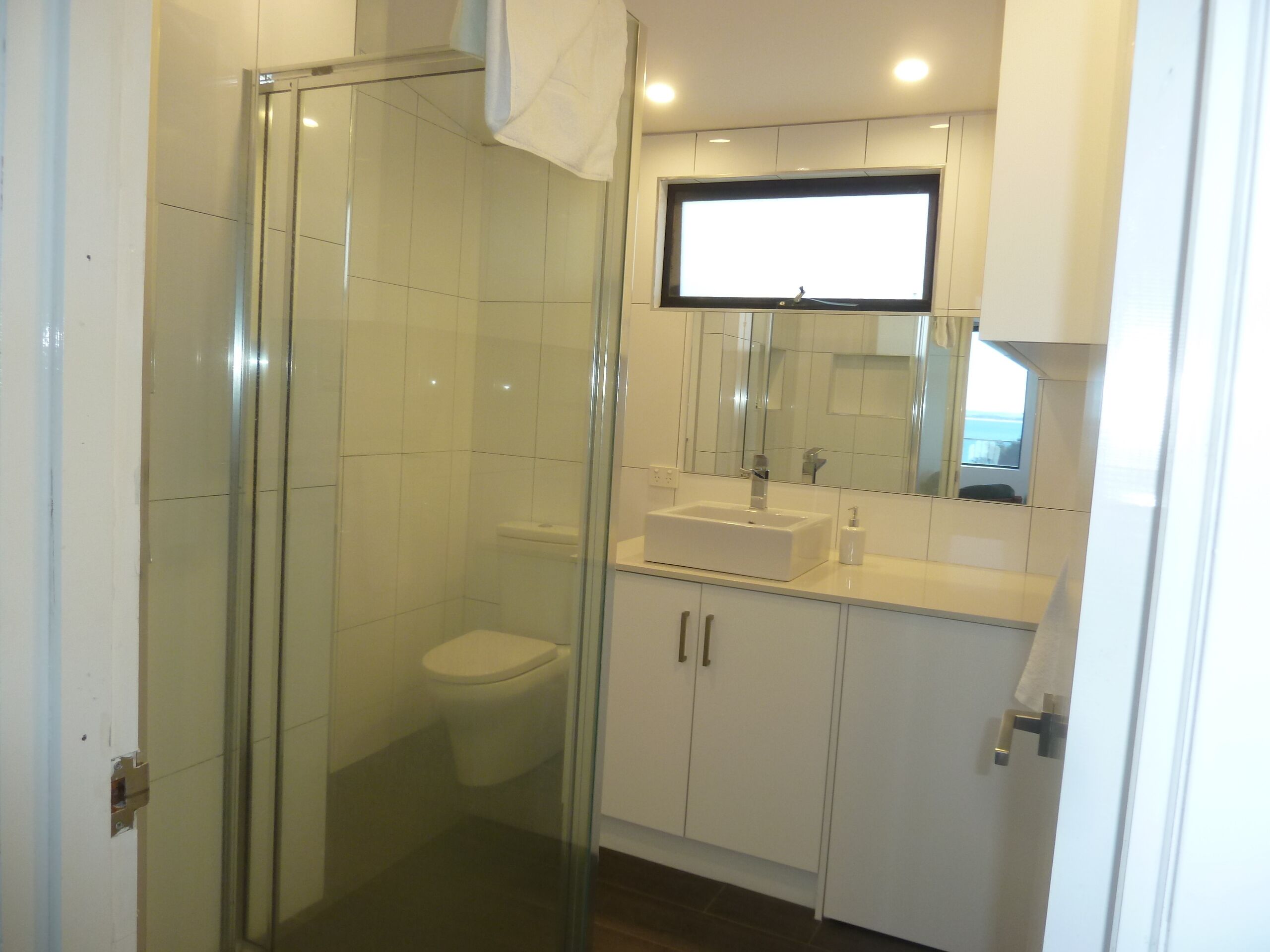 Situated across the road from the beach — image 8