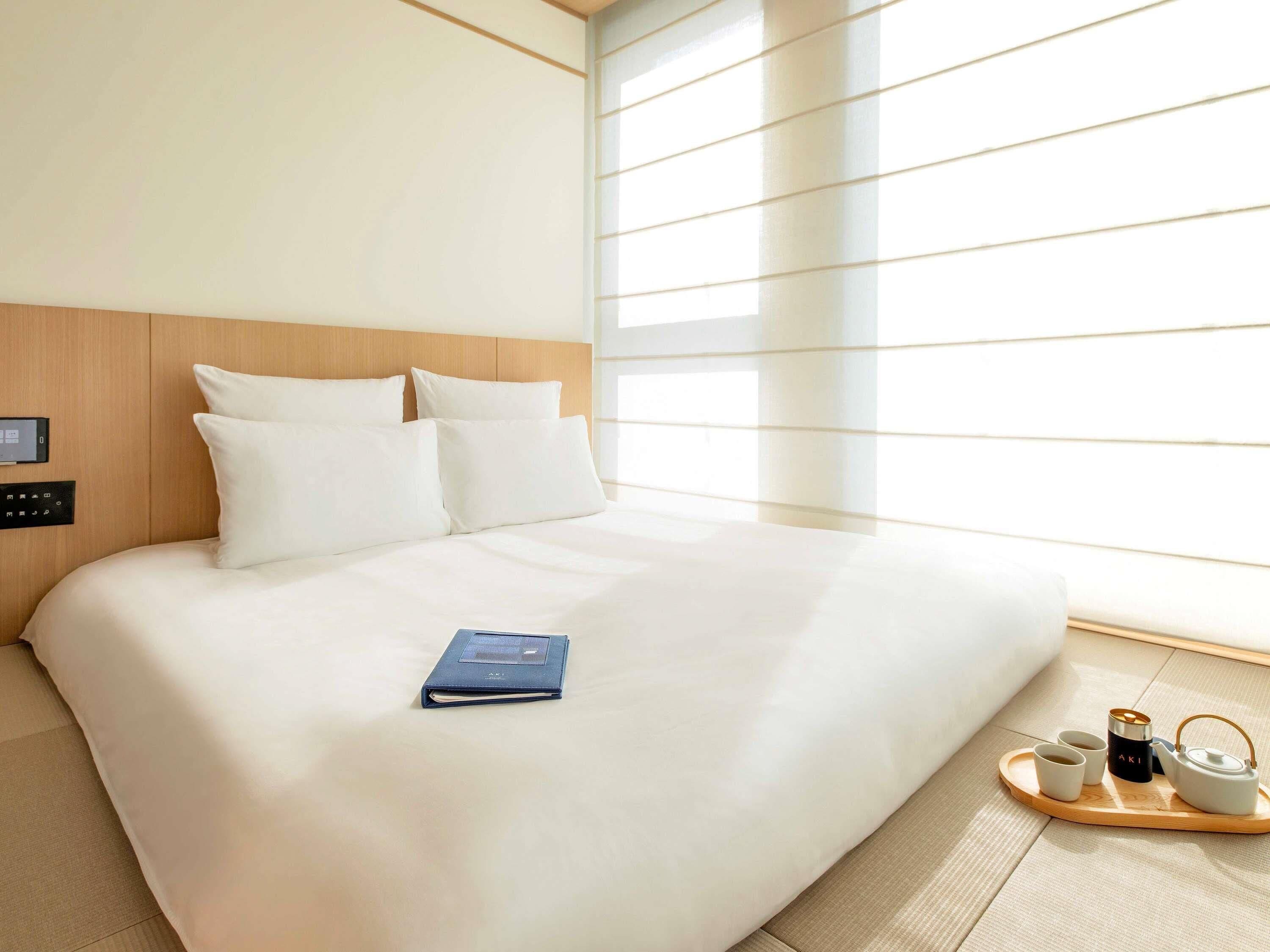 豪华日式榻榻米房 | 迷你吧、客房内保险箱、免费 WiFi、床单