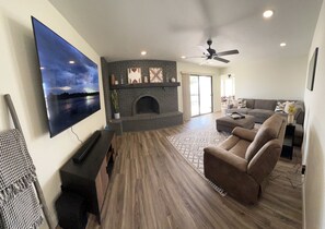 Smart TV, fireplace, books