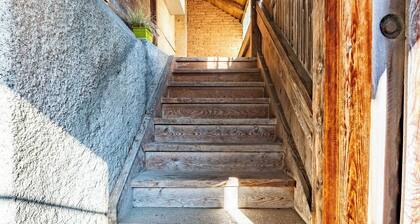 Cozy chalet with wood burning stove surrounded by Swiss Alps
