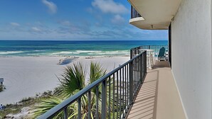 A balcony with a view of the beach and ocean. - Edgewater Beach & Golf Resort VI by Resort Collection (Panama City Beach)
