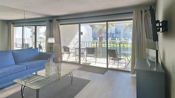 Condo, Multiple Beds, Balcony, Garden View (Villa 512 - No Pets) | Living area | 40-inch TV with cable channels