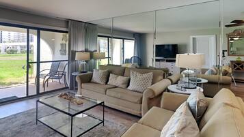 Condo, Multiple Beds, Balcony, Garden View (Villa 505 - No Pets) | Living area | 40-inch TV with cable channels