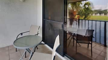 Condo, Multiple Beds, Balcony (Villa 1913 - No Pets) | Outdoor dining